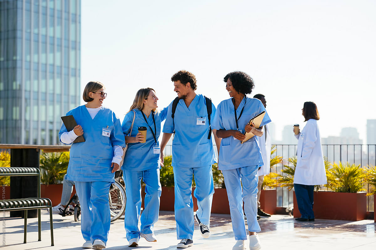 Medical team during conversation on hospital terrace