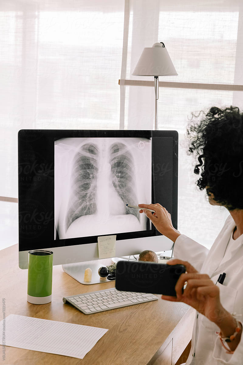 Telemedicine - Doctor Explaining Lung X-Ray
