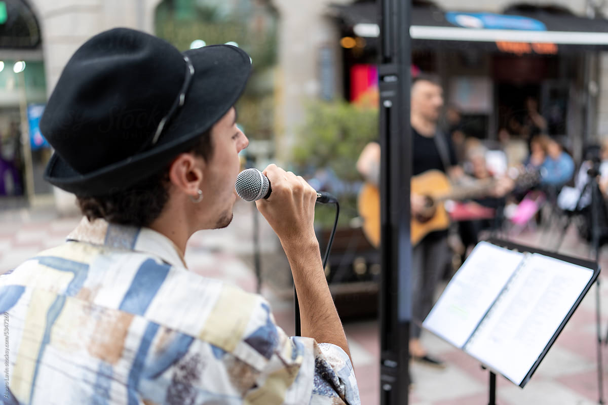 man singing in street concert