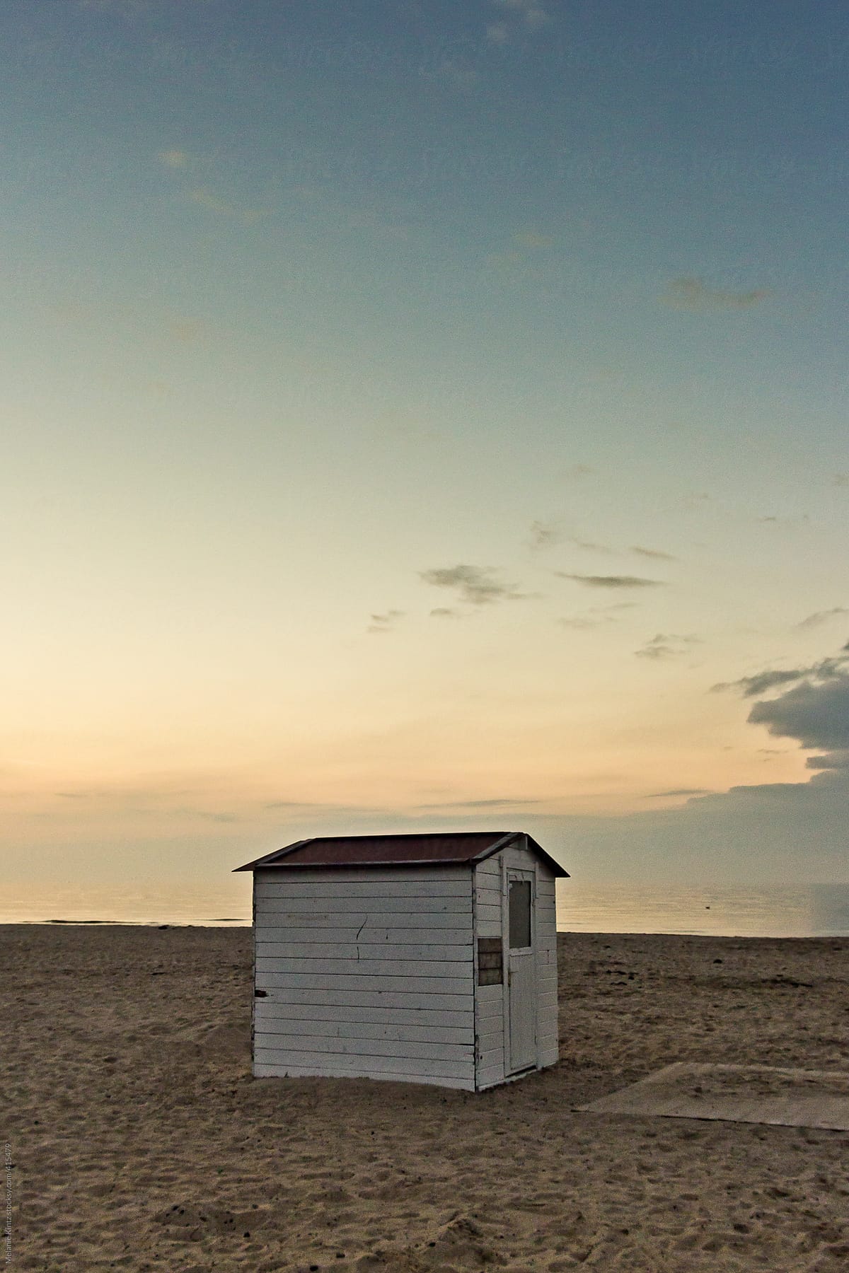 Beach hut on a beach in the evening