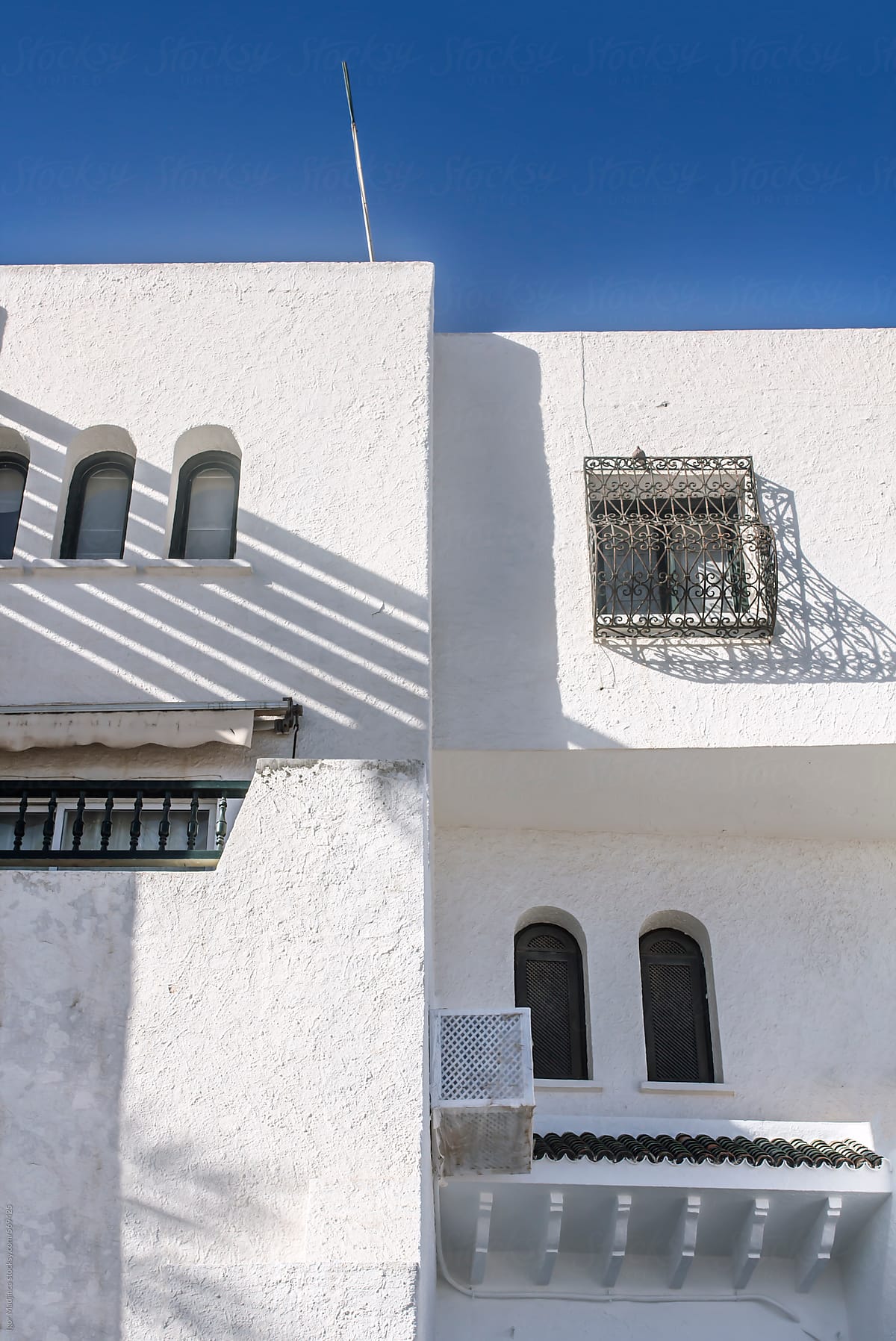 traditional North African architecture, minimalism,shadows, white