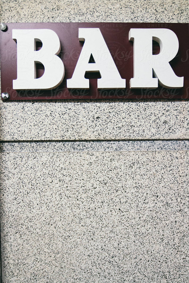 Bar sign with granite rock
