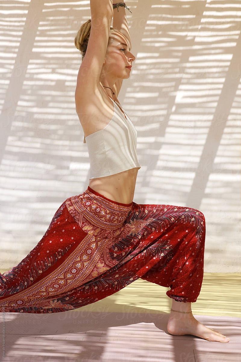 young woman doing yoga pose