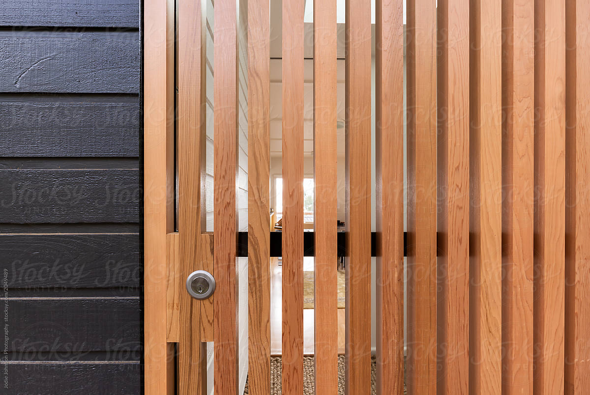 Close Up Background Of A Drying Room Door Of Wooden Slats by Stocksy  Contributor Jodie Johnson Photography  - Stocksy