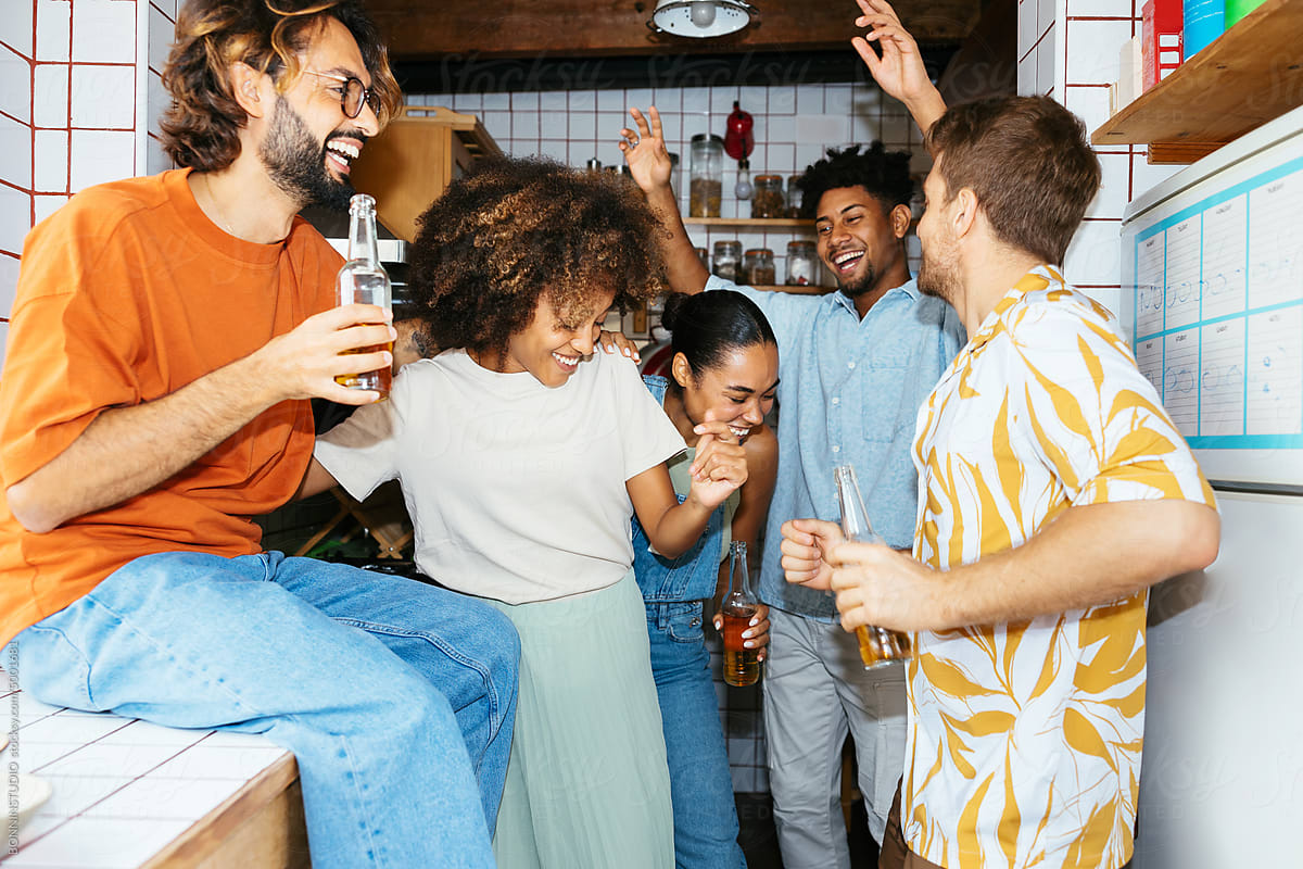 Group of diverse friends having fun together at home