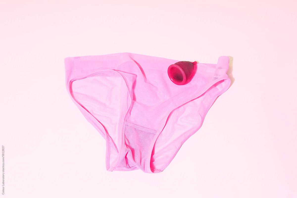 Period essentials: pink underpants and period cup /Normalizing period