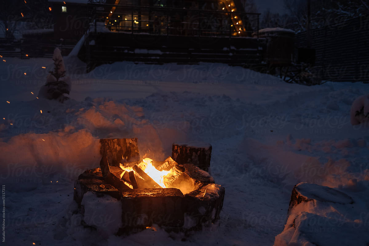 A cozy place by the winter campfire.