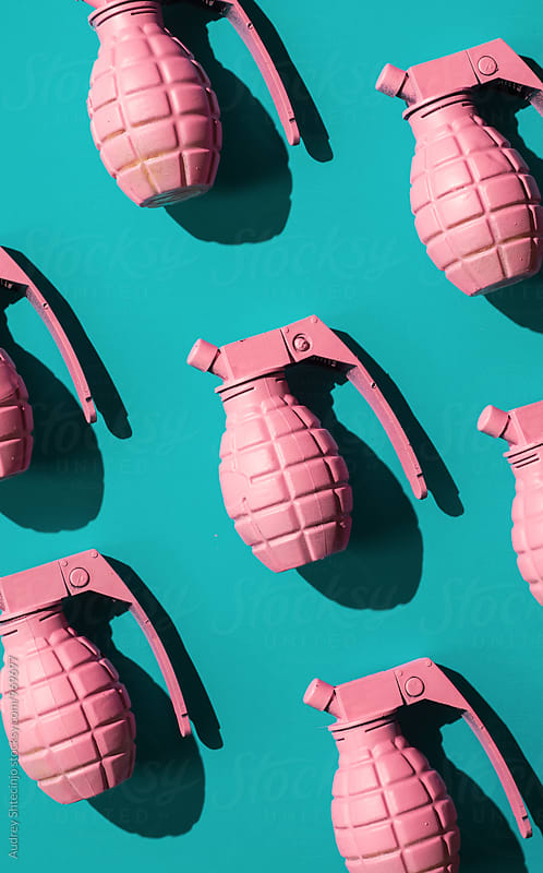 Organised pink had grenades on blue background.