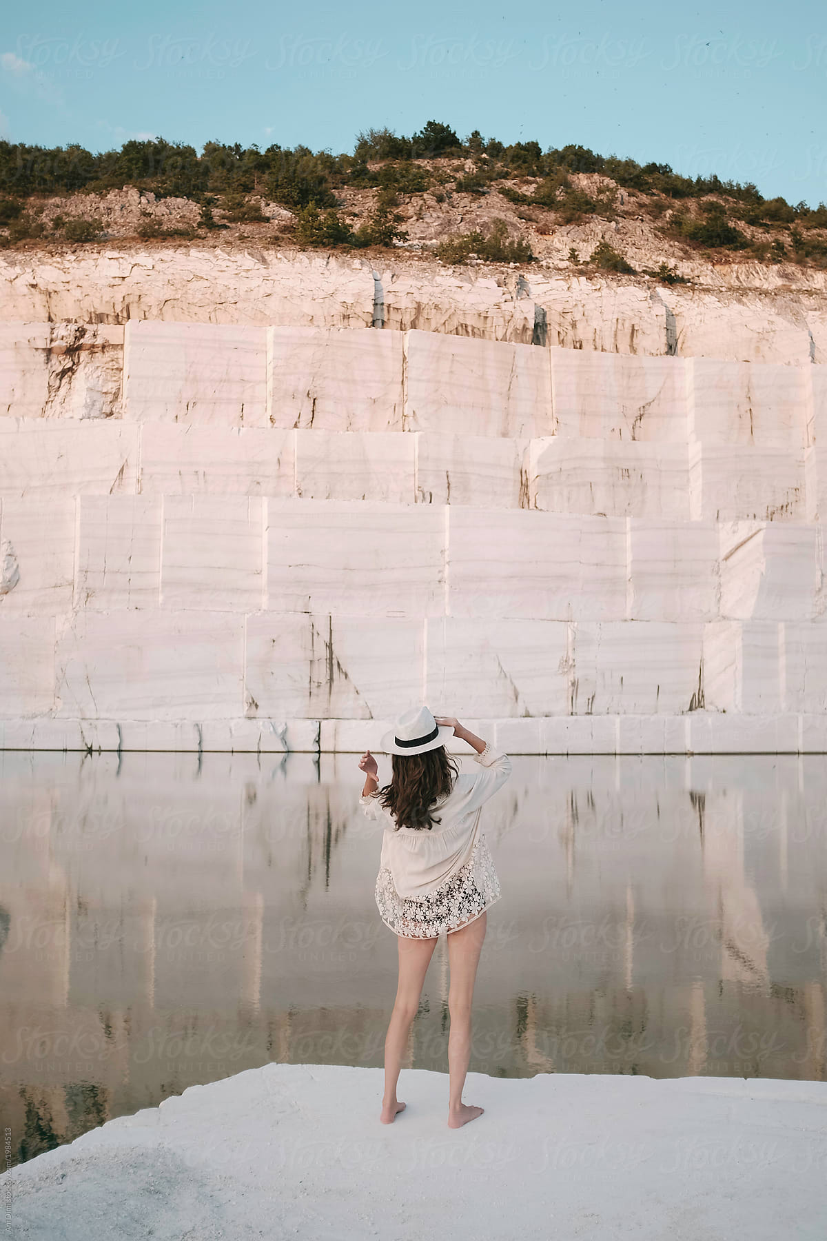 Woman enjoying by the marble lake