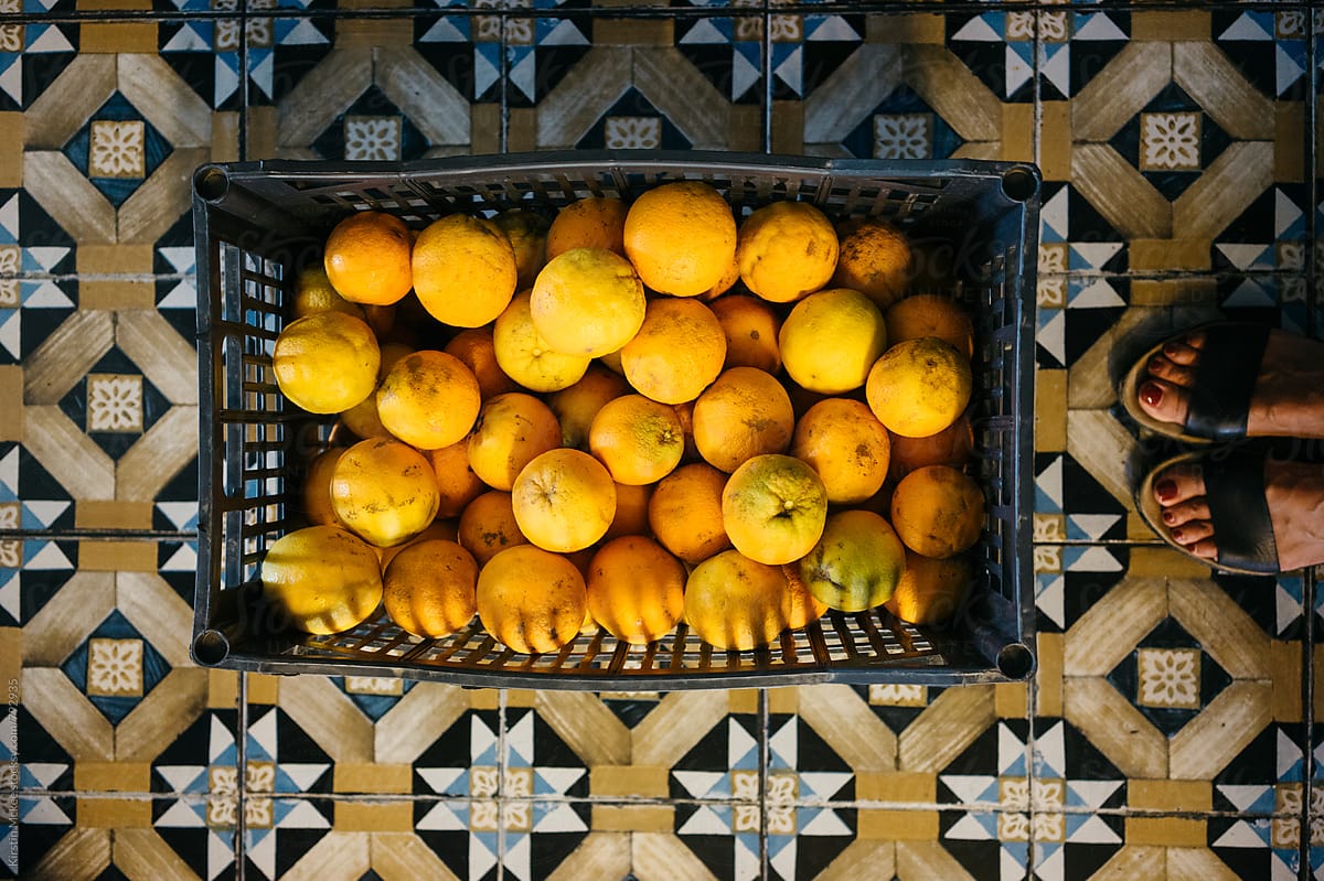 Crate of oranges on floor, Greece