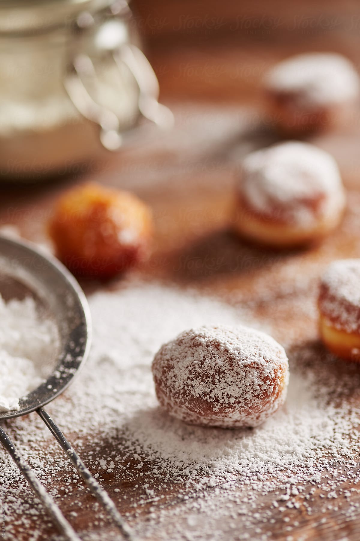 Donut holes dusted with icing sugar