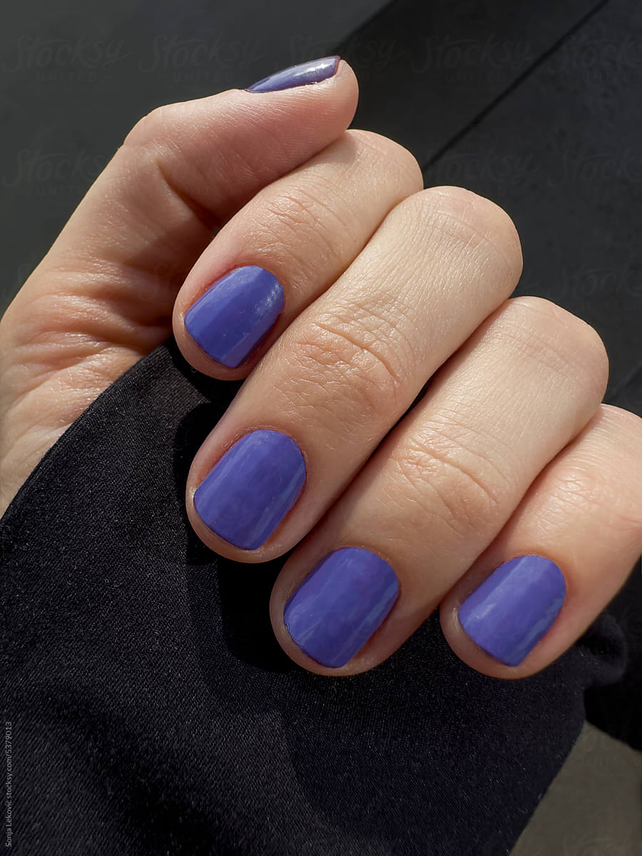violet nails closeup