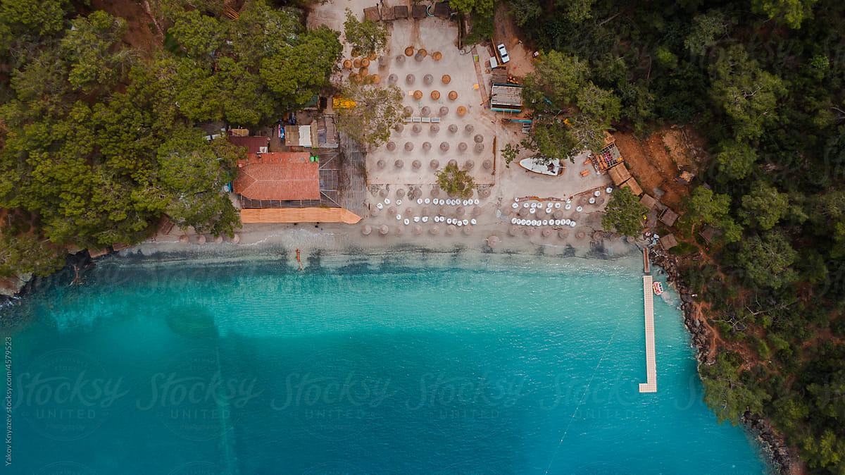 aerial view of a perfect beach in Turkey lost among woods