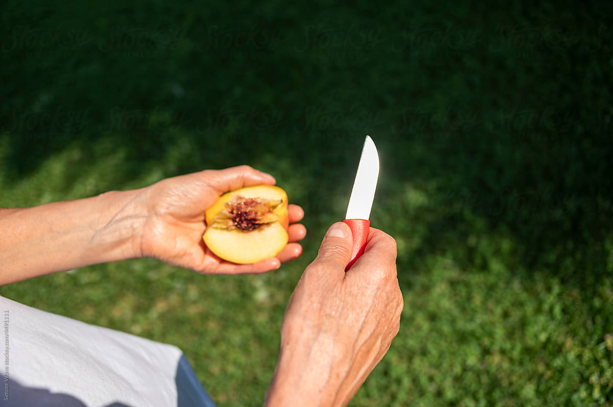 Cutting a peach