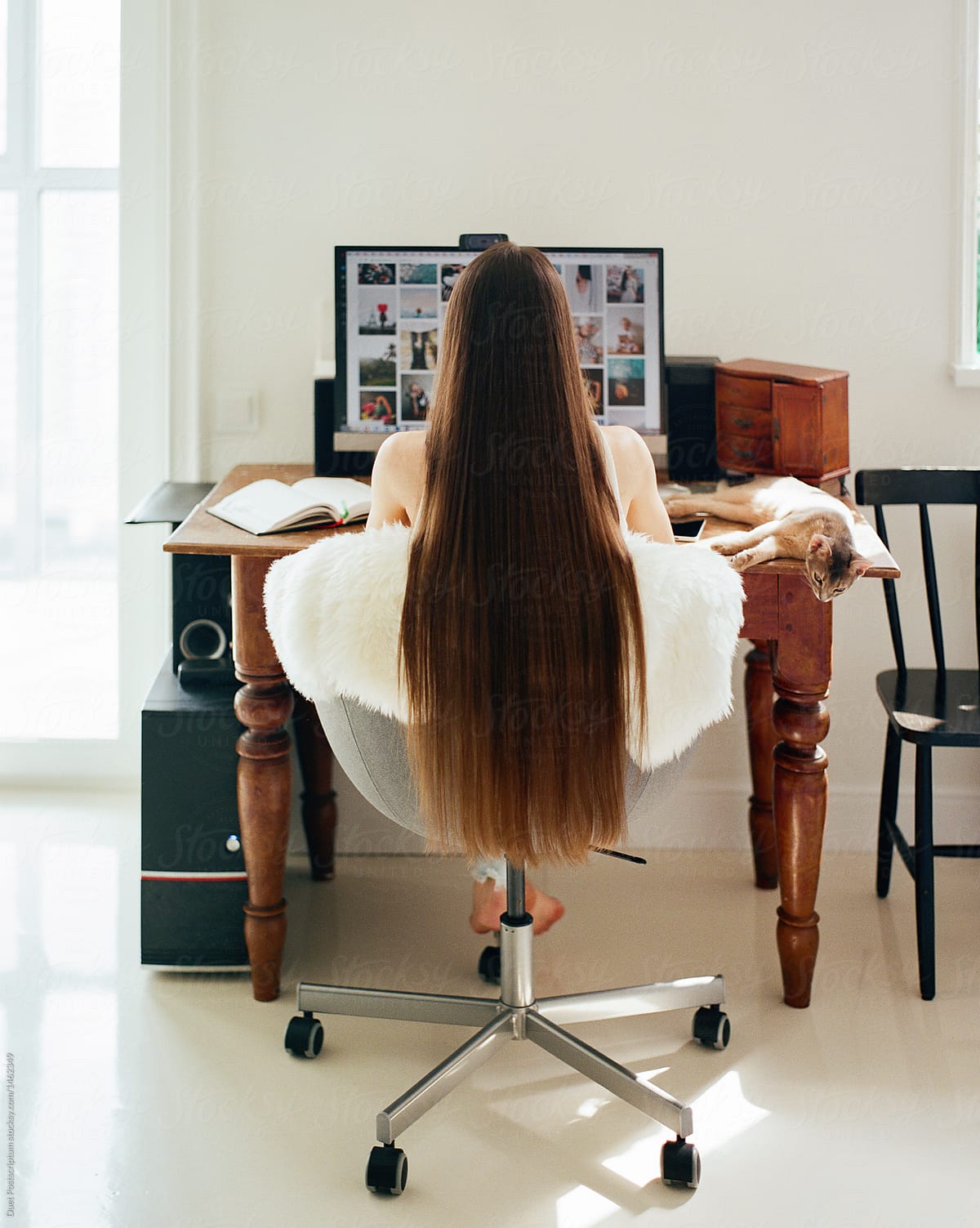 Woman sitting at computer