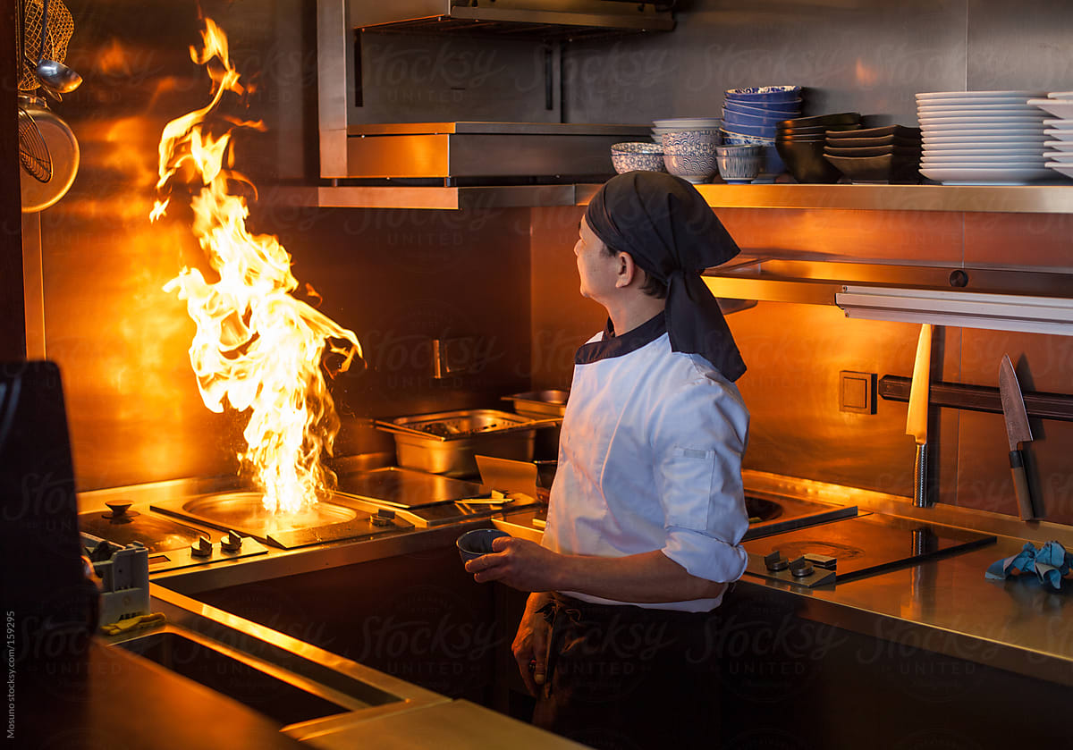 Chef Cooking on Fire in a Japanese Restaurant