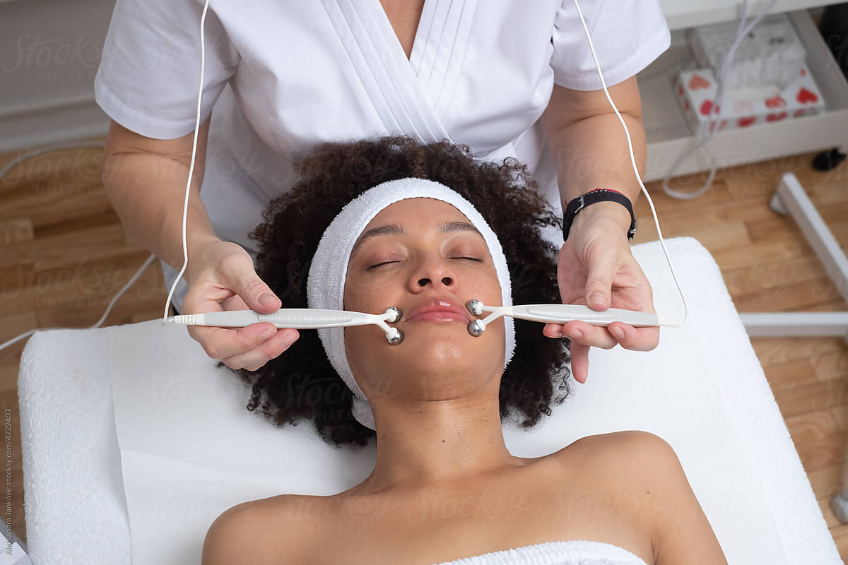 Woman Having A Treatment With Facial Machine
