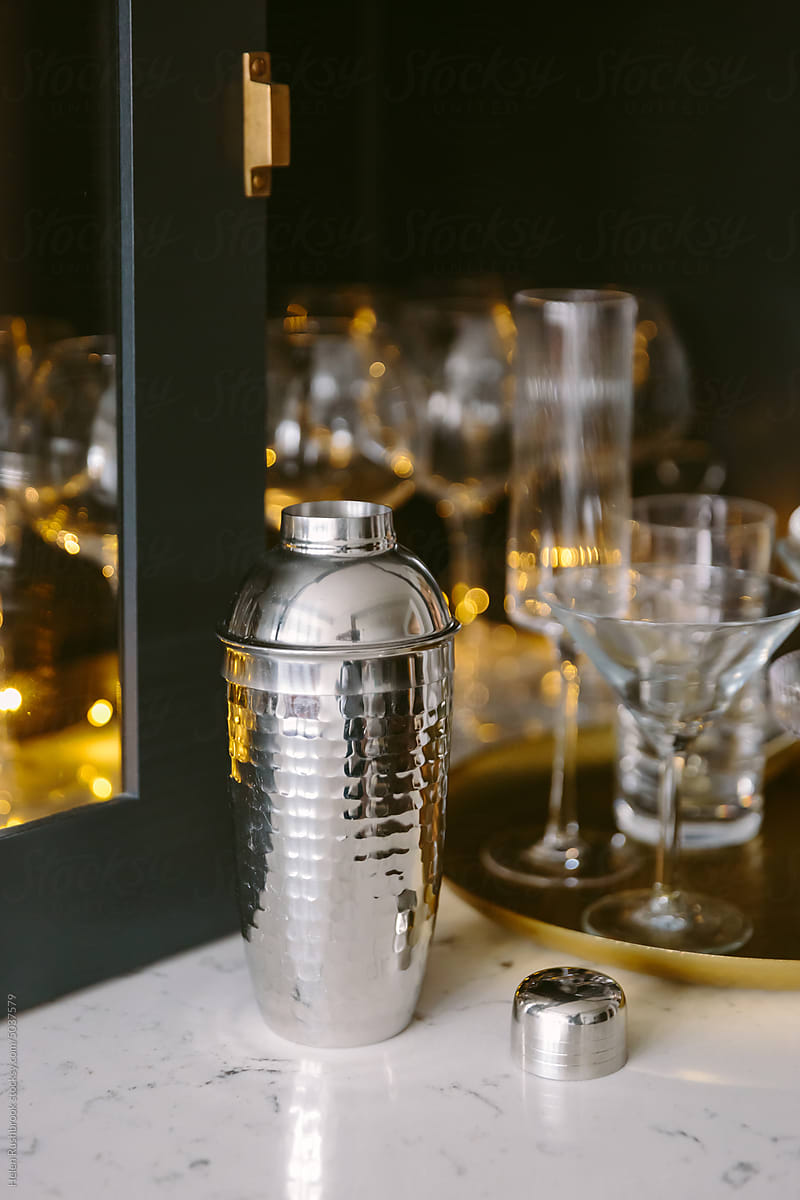 A hammered silver cocktail shaker