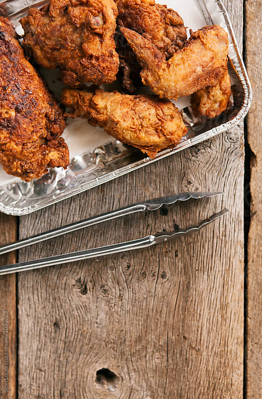 Fried: Tray Of Crispy Chicken With Tongs And Copyspace