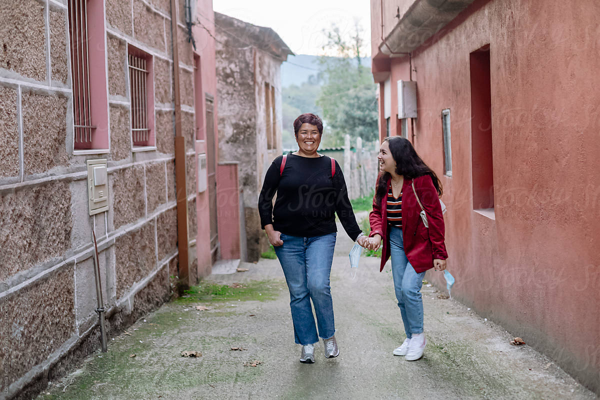 Mother and daughter in ancient town