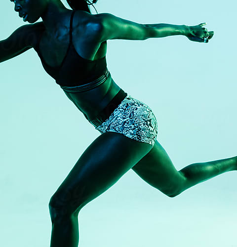 Slim Women In Sport Underwear On Brown Background by Stocksy Contributor  Javier Díez - Stocksy