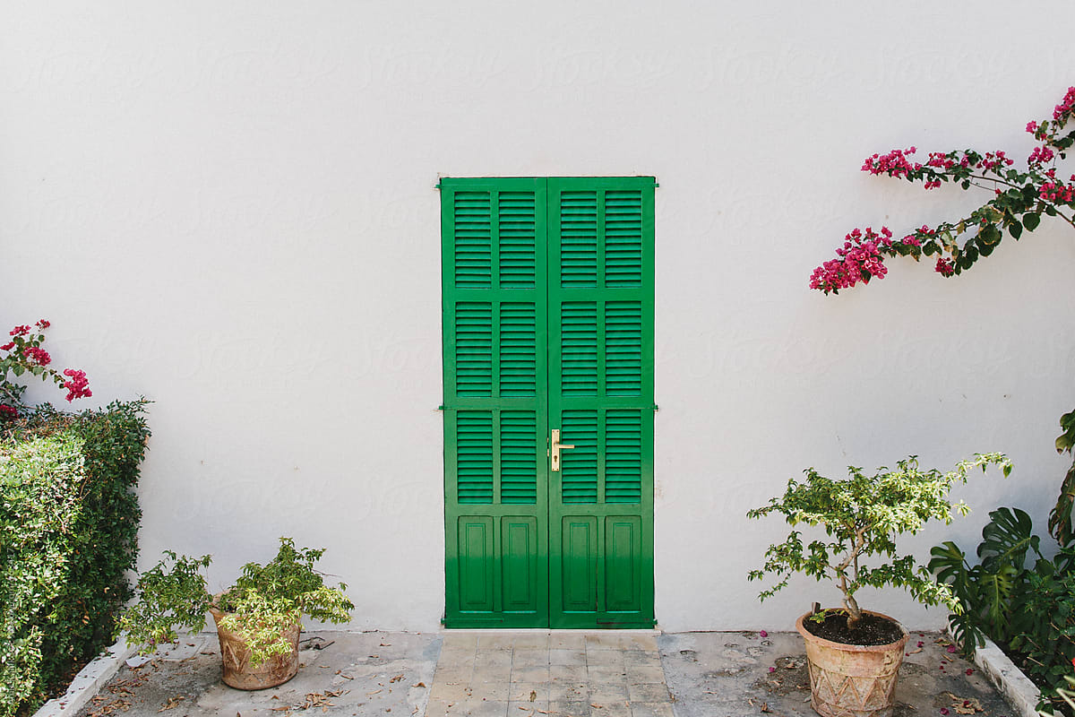 Green Shuttered Door Leading to Mallorca Garden