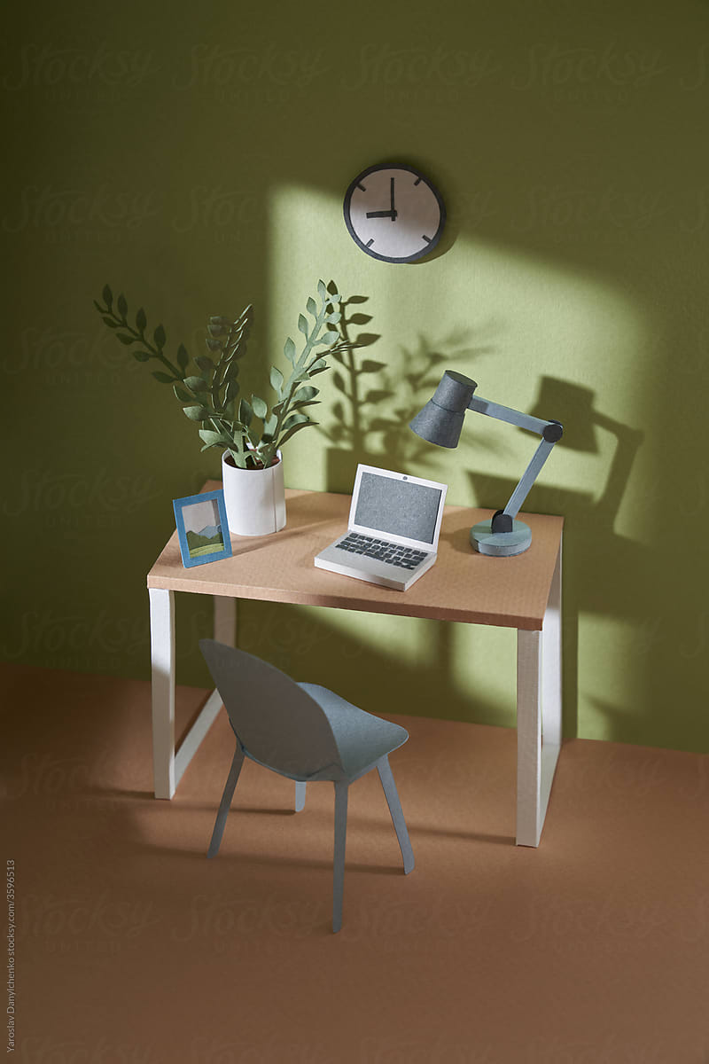Papercraft room with table for freelance work