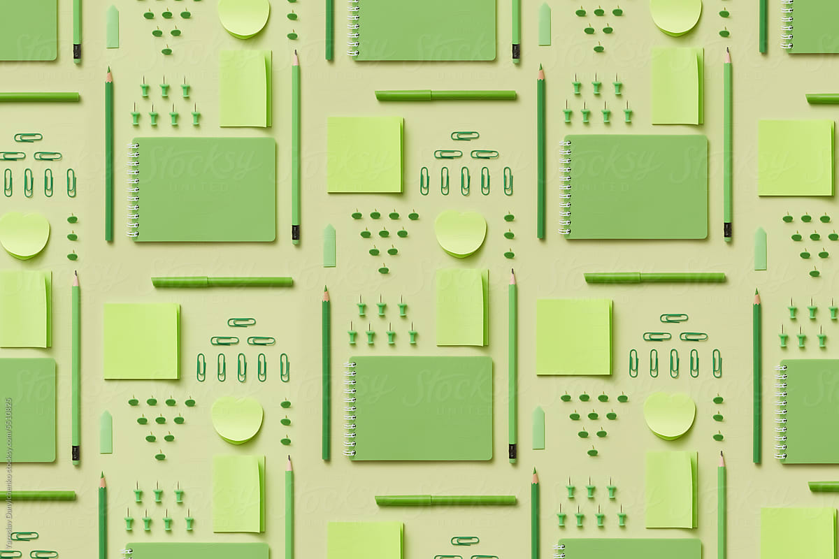 Pattern featuring stationery essentials in green colors.