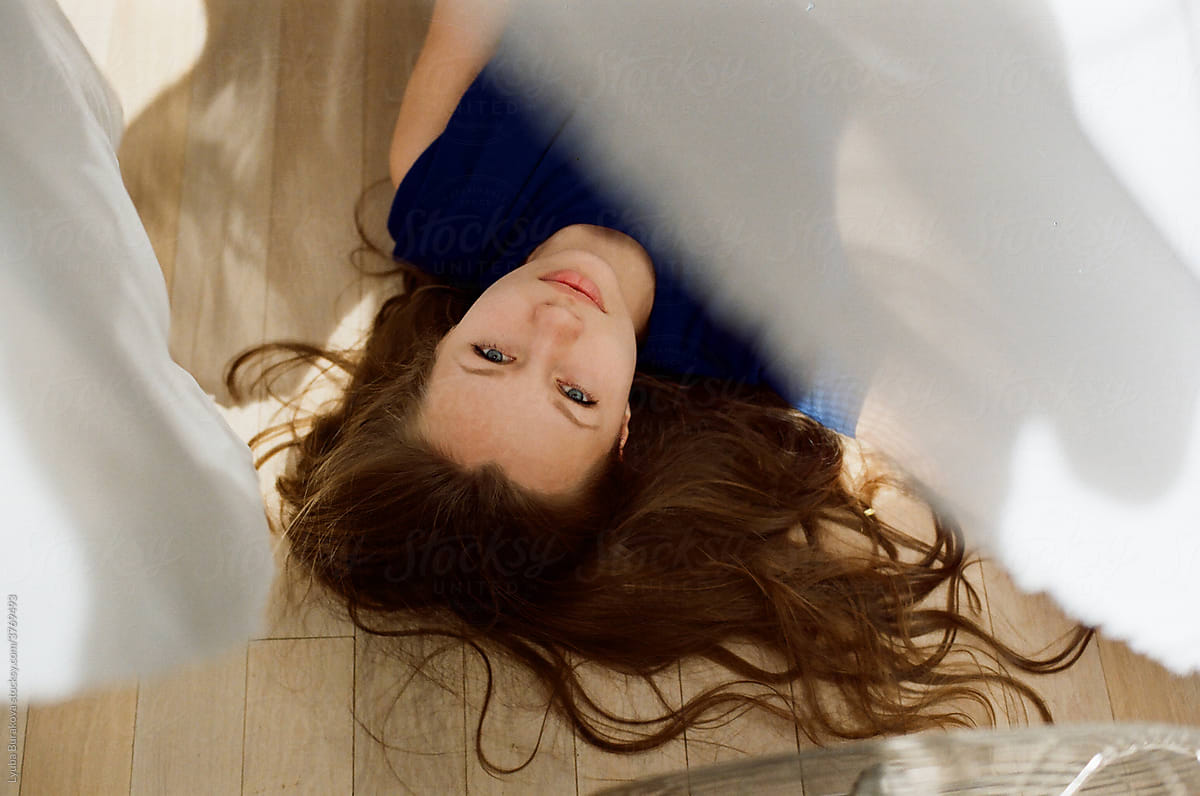 Young woman lying on a floor