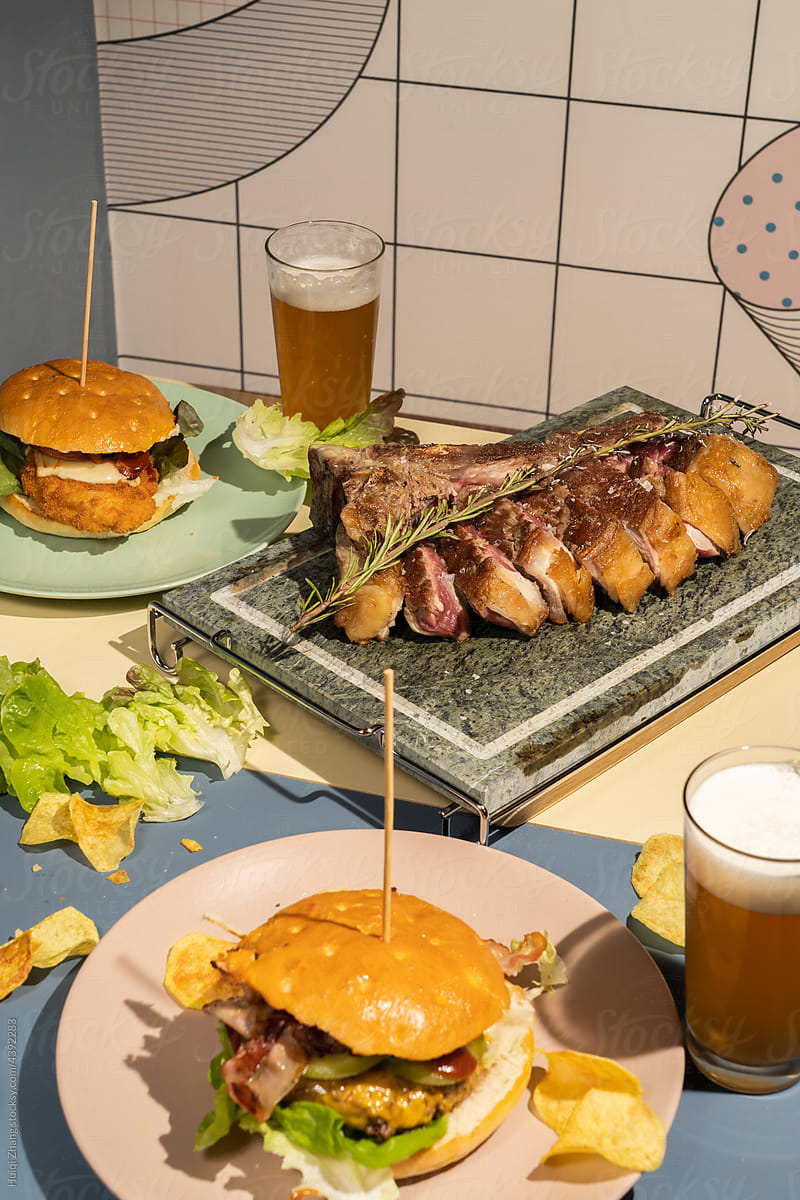 Italian style hamburger and steak on the table