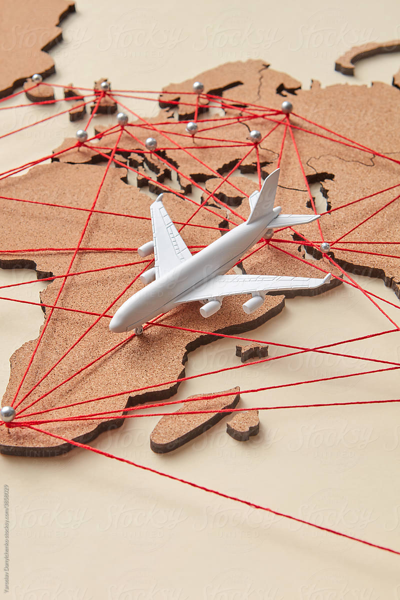 Closeup of plane miniature on map with connections