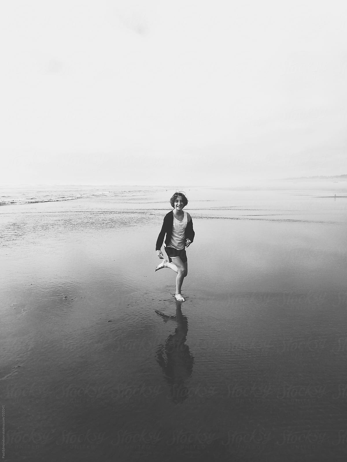 Happy Eleven Year Old Girl Running On Beach By Stocksy Contributor Rialto Images Stocksy 4425