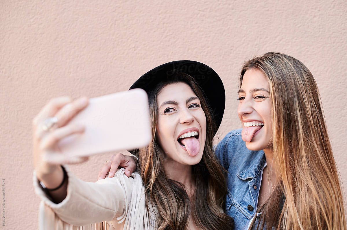 Best friends selfie tongue out.