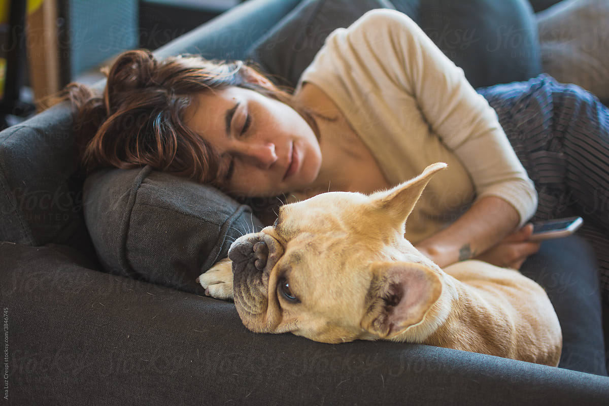 Woman takes nap with her pet