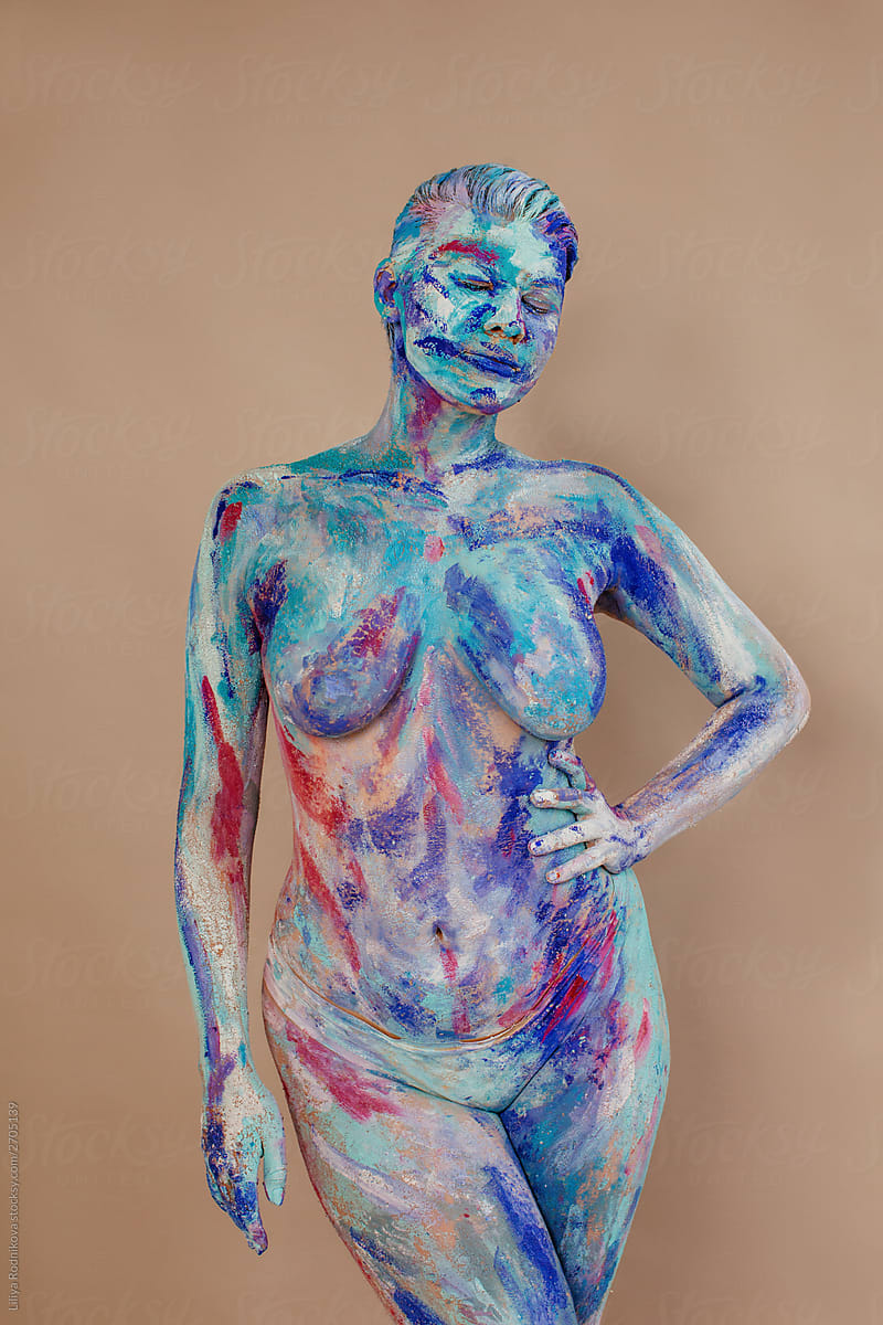 Naked female with colorful body art