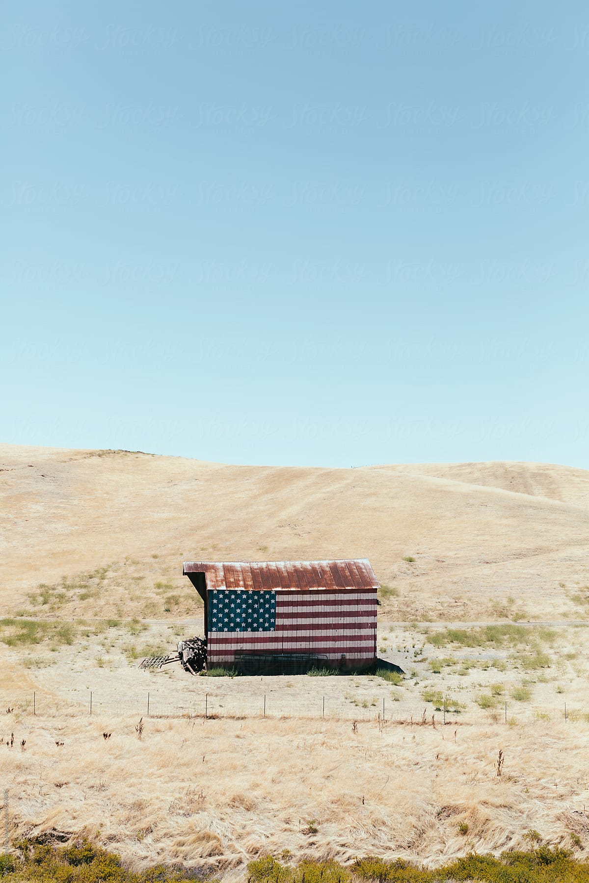 American flag painted on an old barn in California