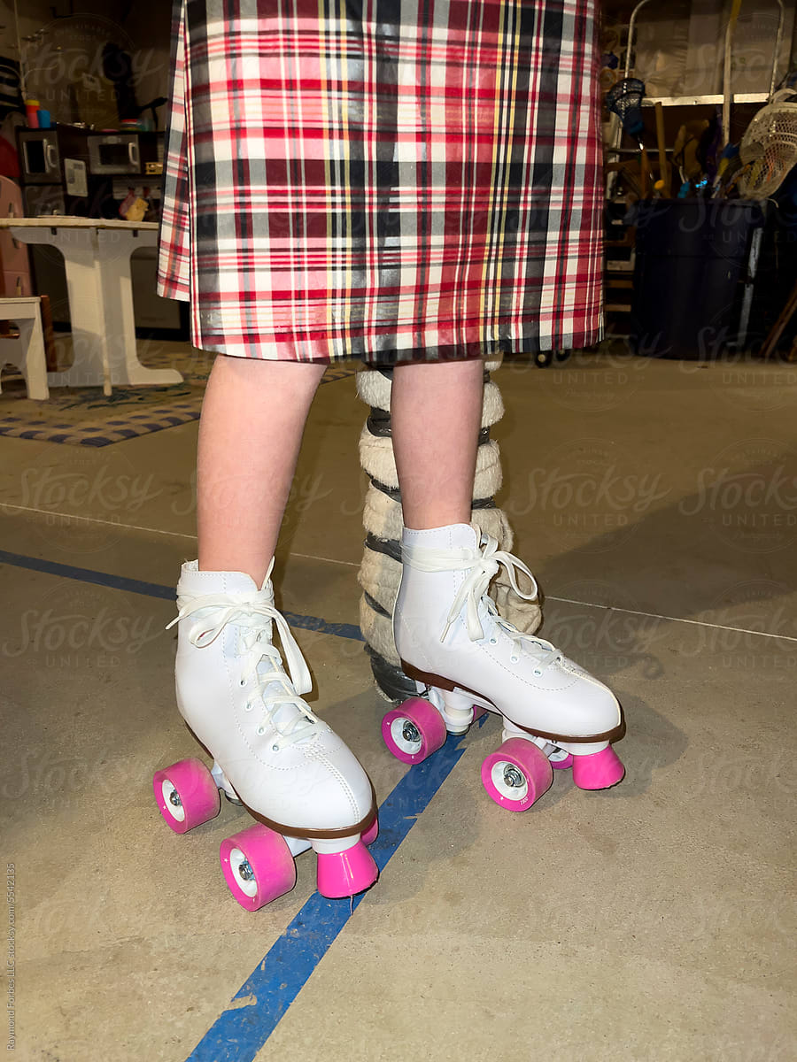 Child rollerskating in basement UGC and skirt