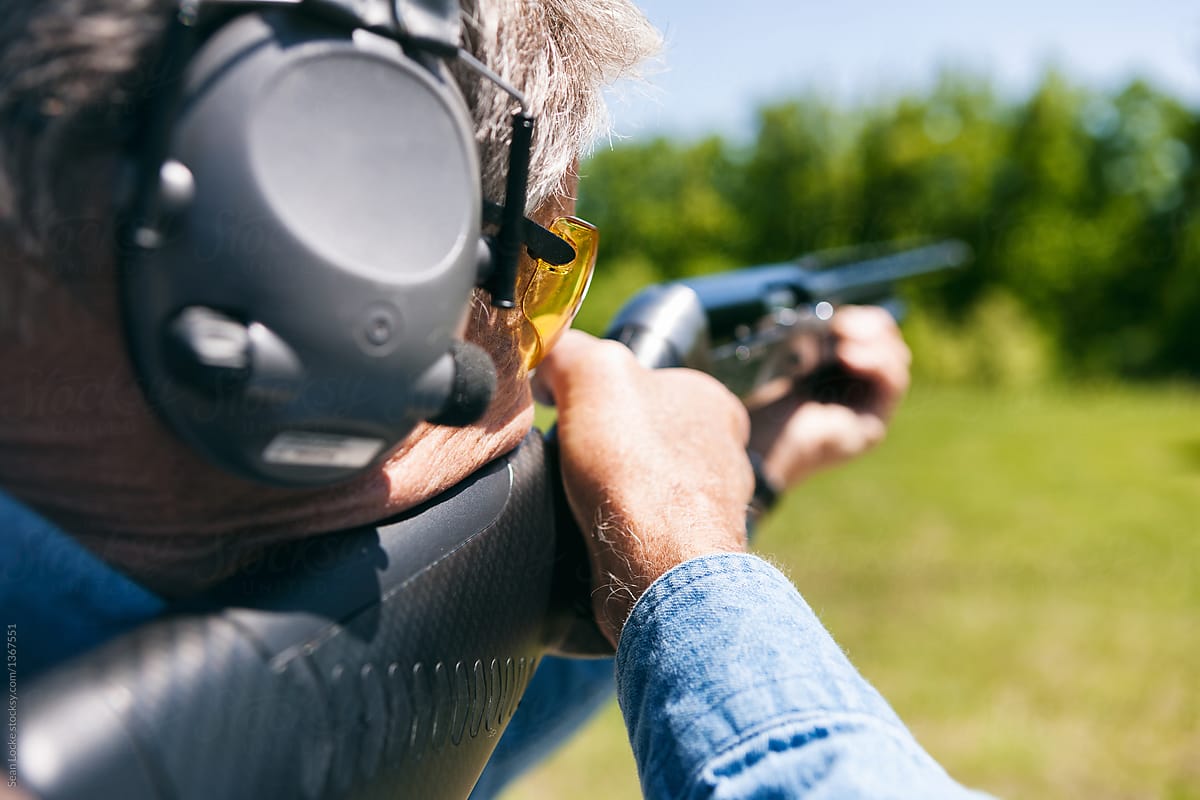 Shooting: Focus On Safety Glasses Of Man During Shotgun Shooting