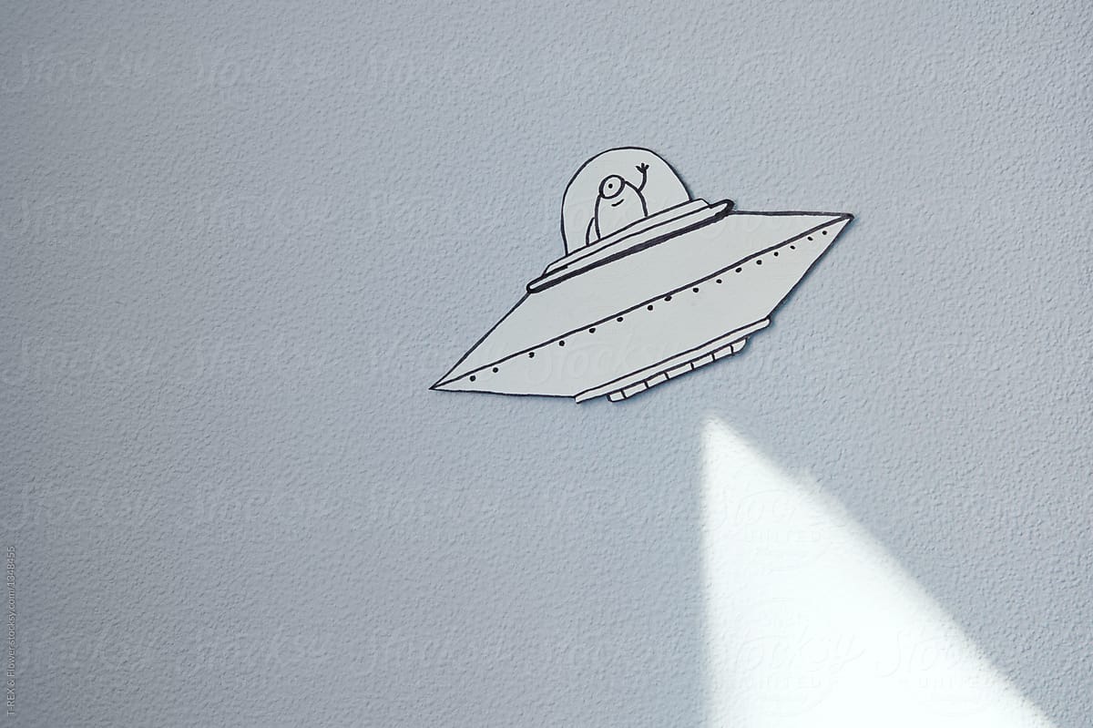 The alien sticker on the wall