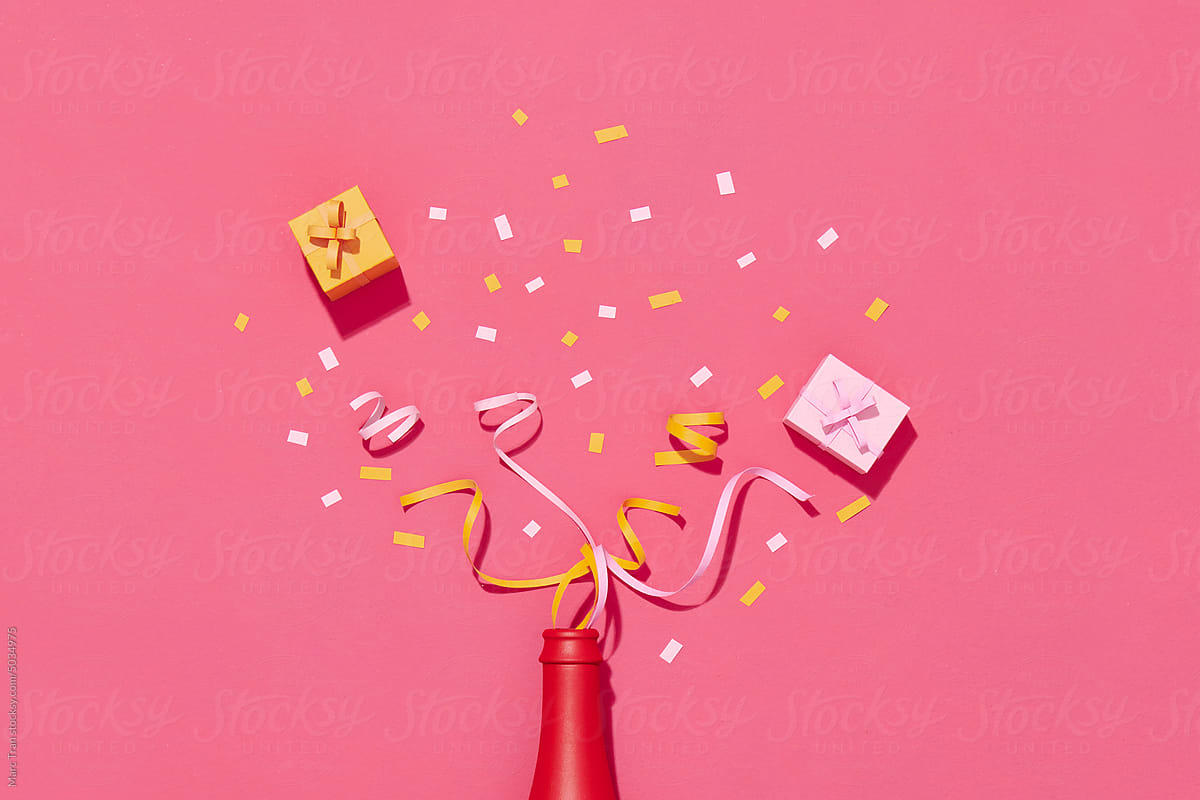 Creative layout with Champagne bottle and colorful glitter