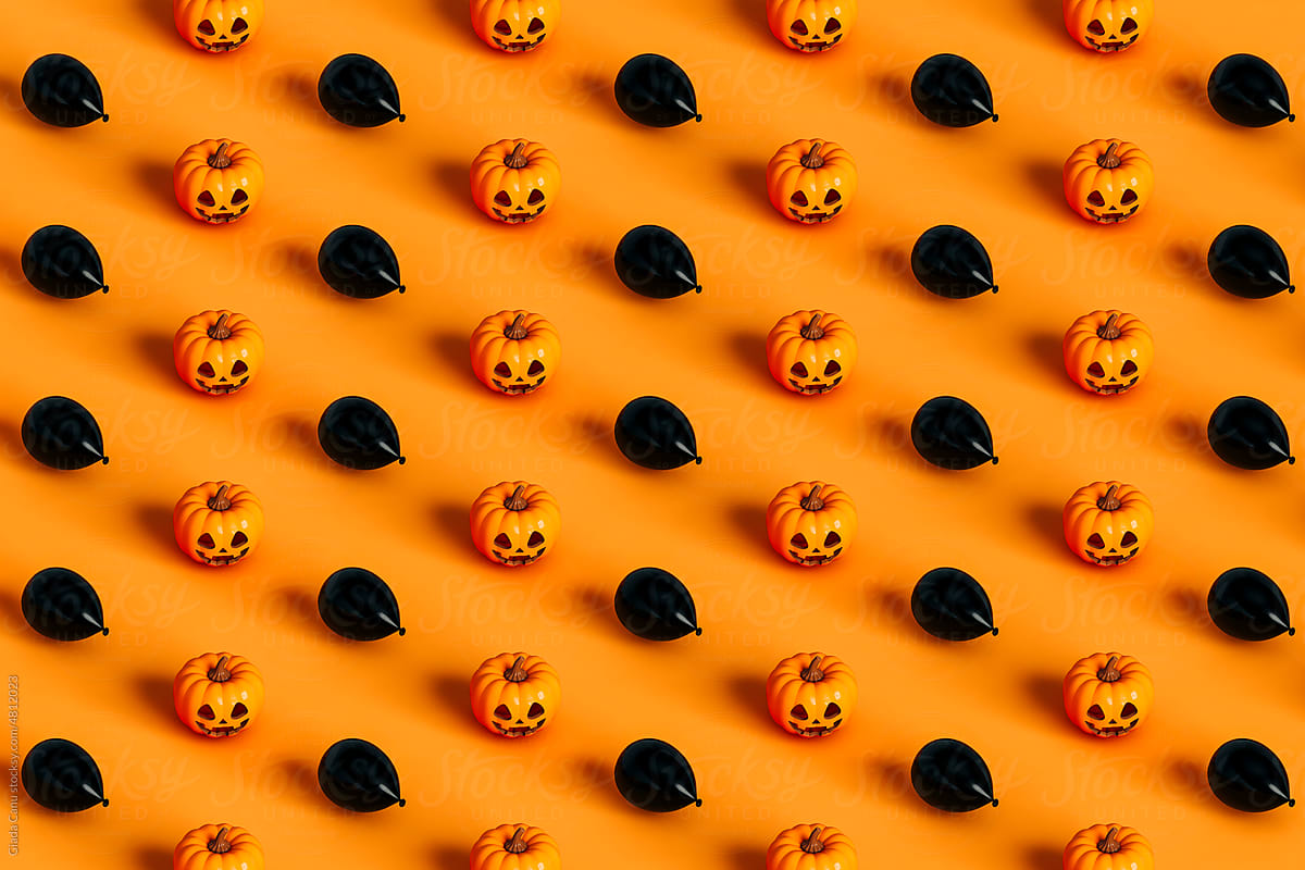 isometric pattern of Halloween pumpkin and black balloon