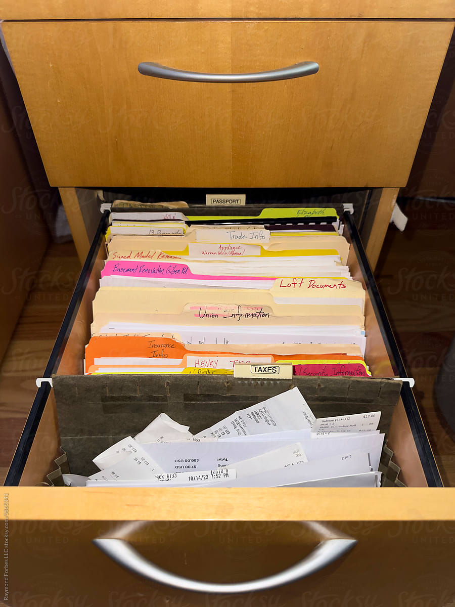 Tax Receipts in in file folder in file cabinet