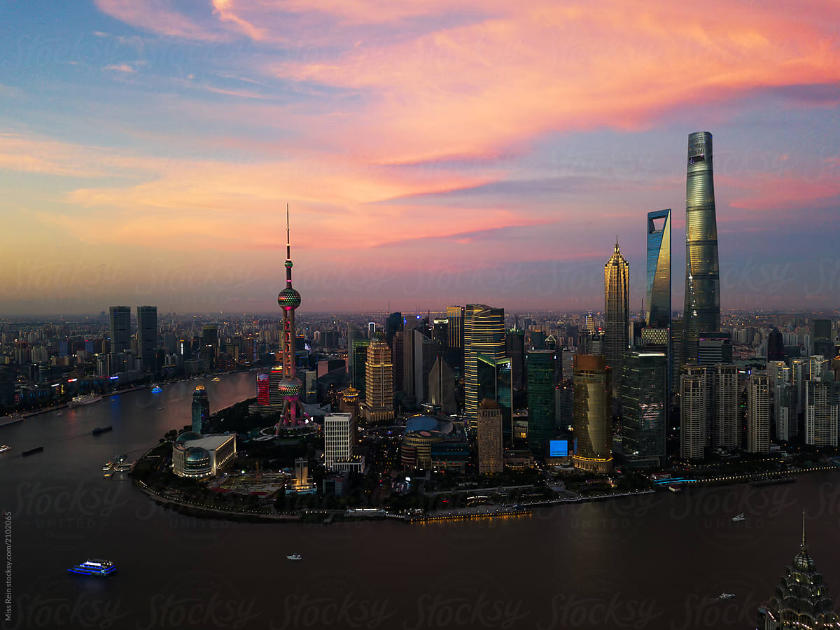 Panoramic photo of sunrise on the Bund with morning glow