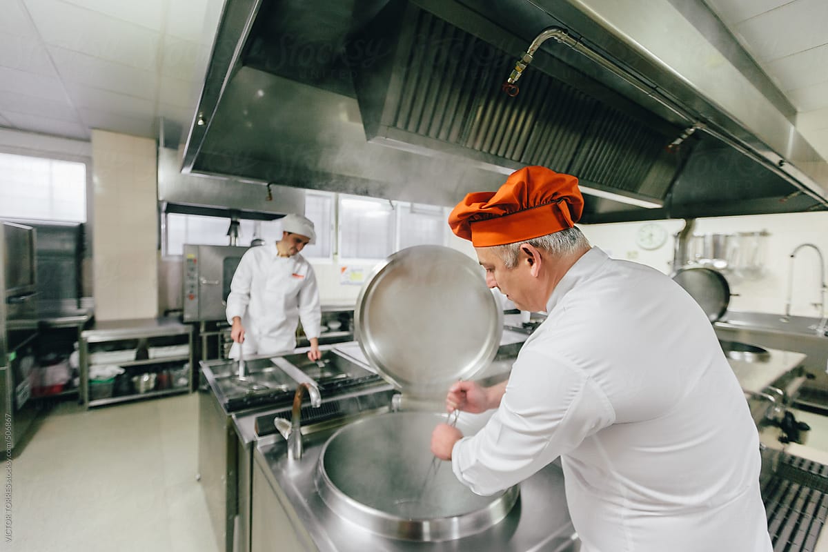 Chef Preparing Food in a Professional Kitchen