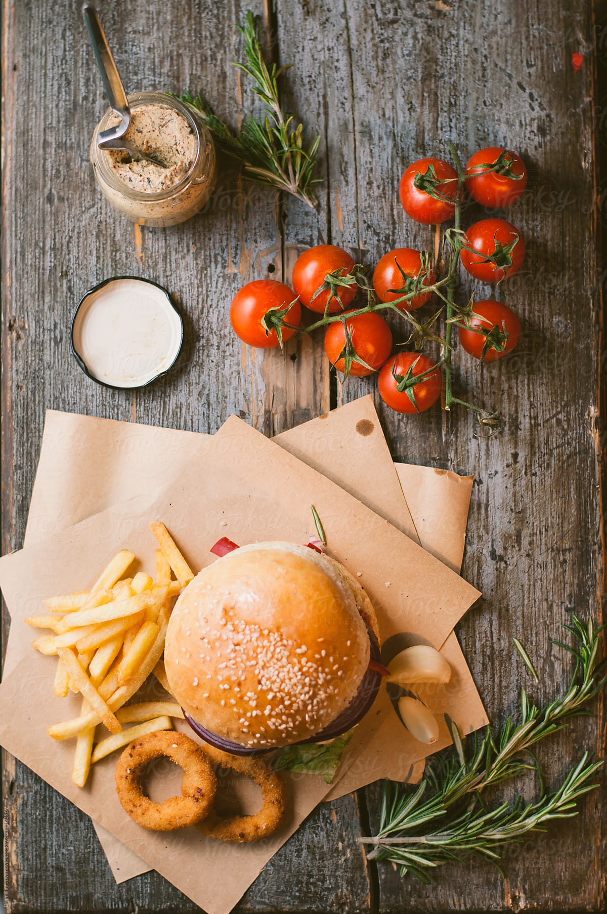 Beef Burger With Fries And Cherry Tomotoes