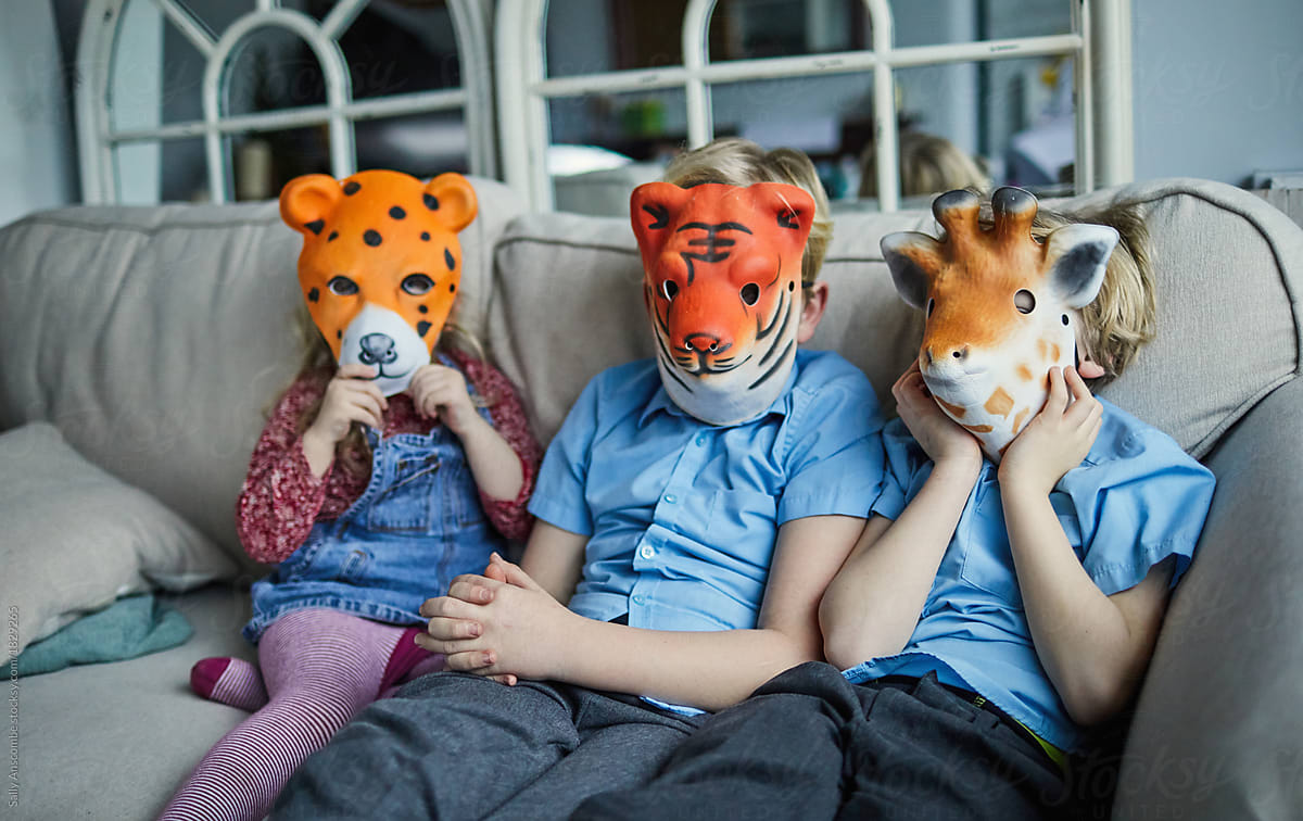 Children wearing animal masks