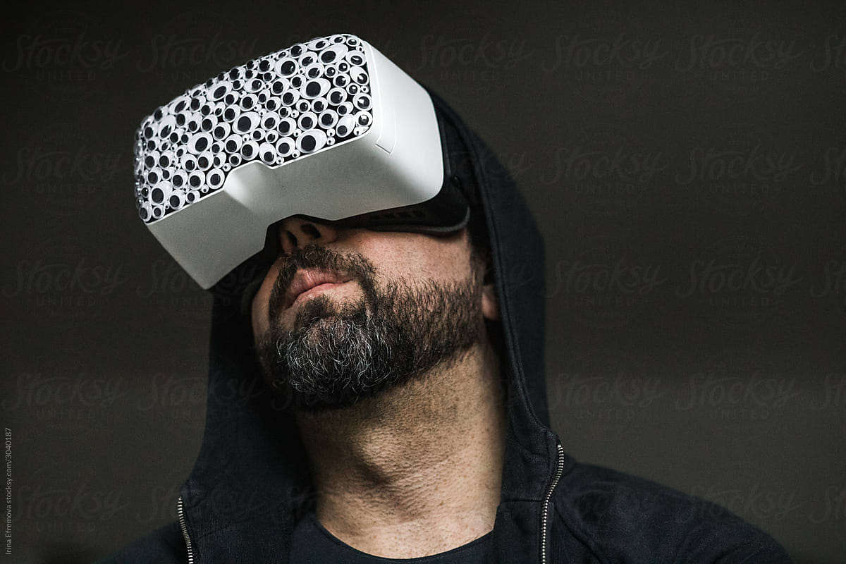 Man In A VR Headset" by "Irina Efremova" - Stocksy