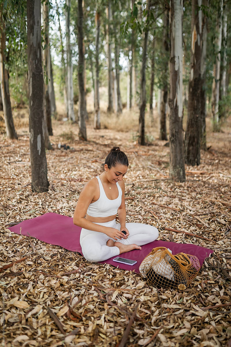 woman practicing yoga in nature
