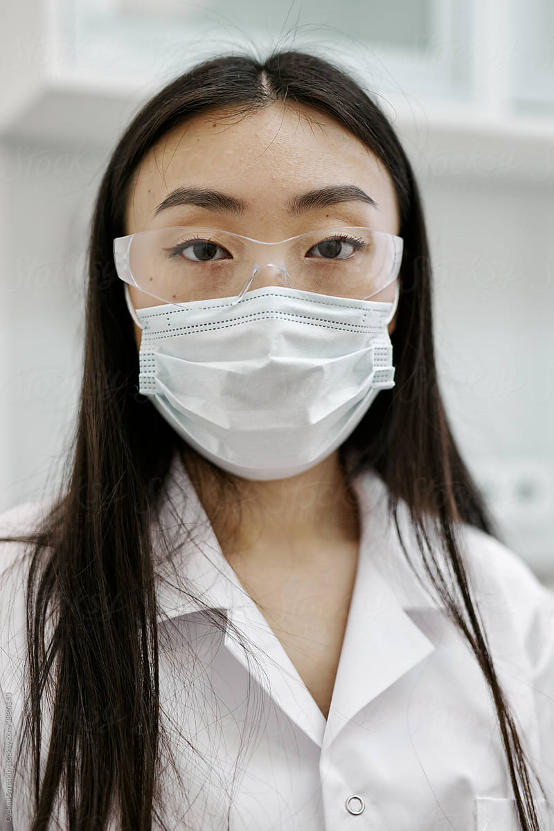 Female doctor wearing in protective clothes