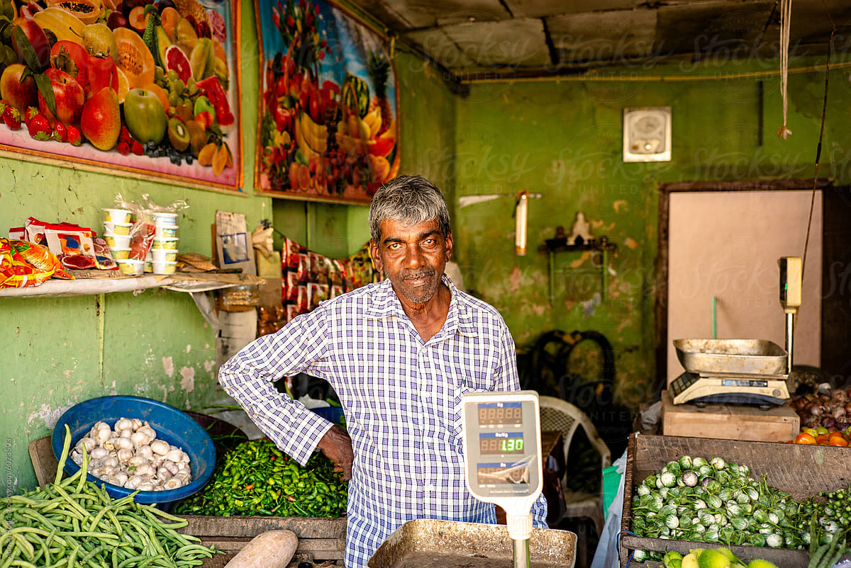 Man selling fruit and vegetables in Sri Lanka